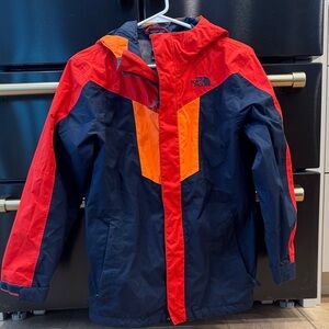 The North Face Kids Vibrant Red and Navy ski jacket shell